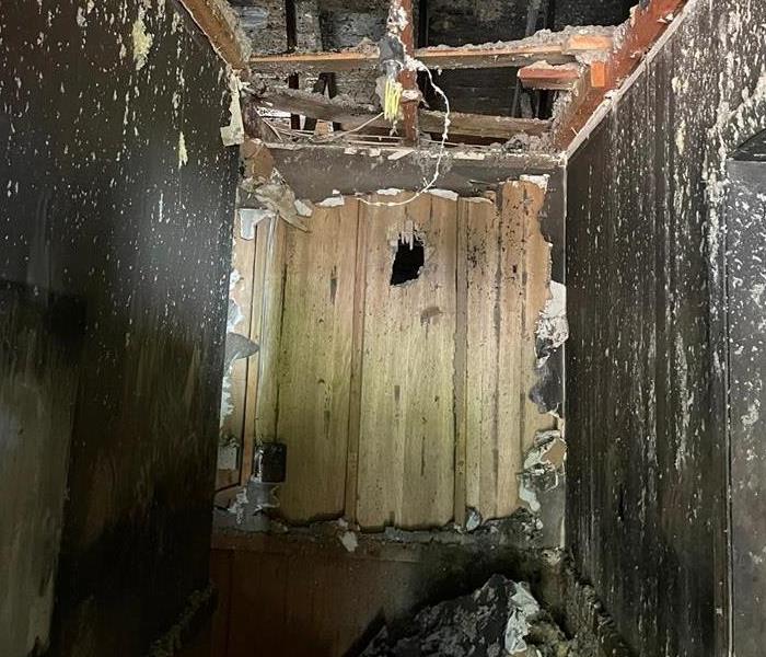 blackened living room after fire